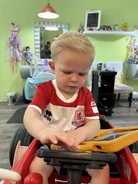 Boy haircut at Sparkles and Spikes kids salon #044