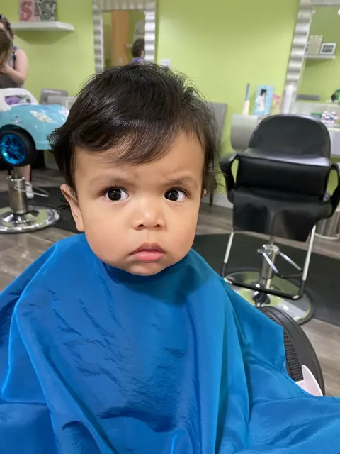 Boy haircut at Sparkles and Spikes kids salon #065