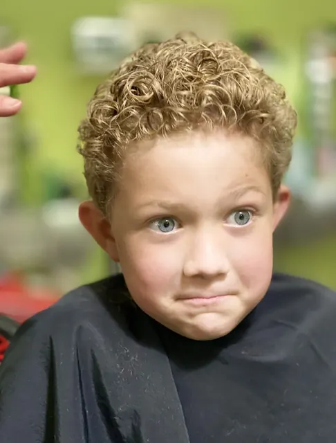 Boy haircut at Sparkles and Spikes kids salon #086