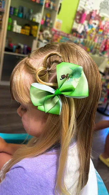 Braids and styled hair at Sparkles and Spikes kids salon #046