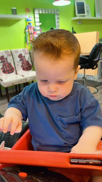First haircut moment at Sparkles and Spikes kids salon #007