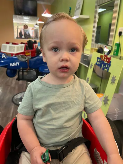 First haircut moment at Sparkles and Spikes kids salon #019