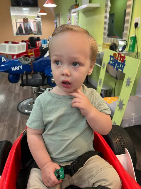 First haircut moment at Sparkles and Spikes kids salon #020