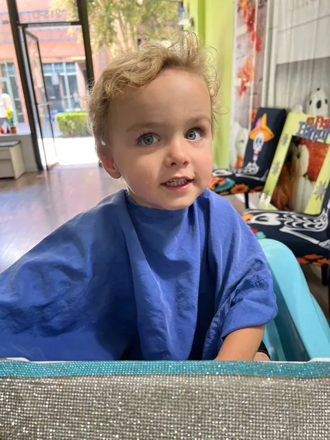 First haircut moment at Sparkles and Spikes kids salon #021