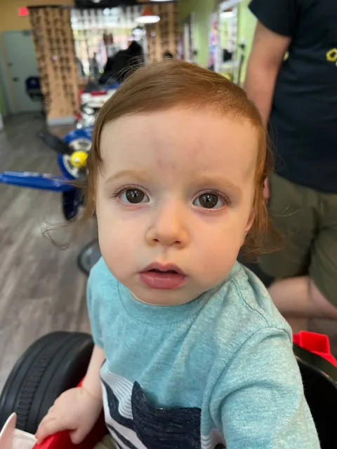 First haircut moment at Sparkles and Spikes kids salon #027