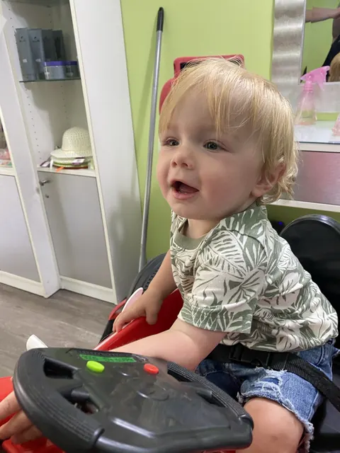 First haircut moment at Sparkles and Spikes kids salon #068