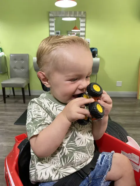 First haircut moment at Sparkles and Spikes kids salon #069