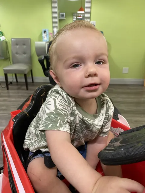 First haircut moment at Sparkles and Spikes kids salon #070