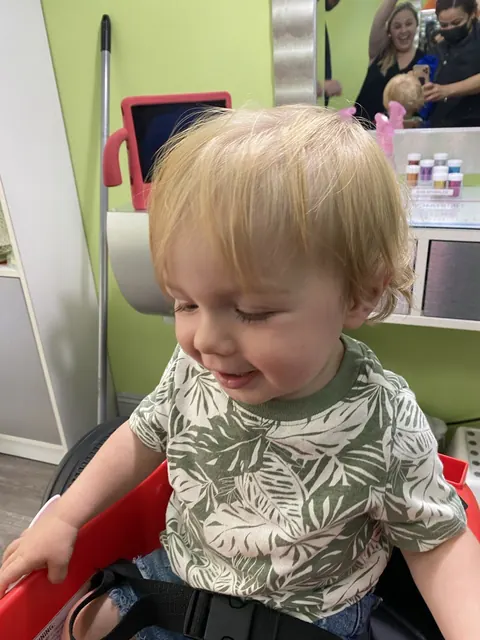 First haircut moment at Sparkles and Spikes kids salon #071