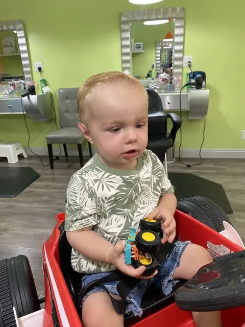 First haircut moment at Sparkles and Spikes kids salon #072