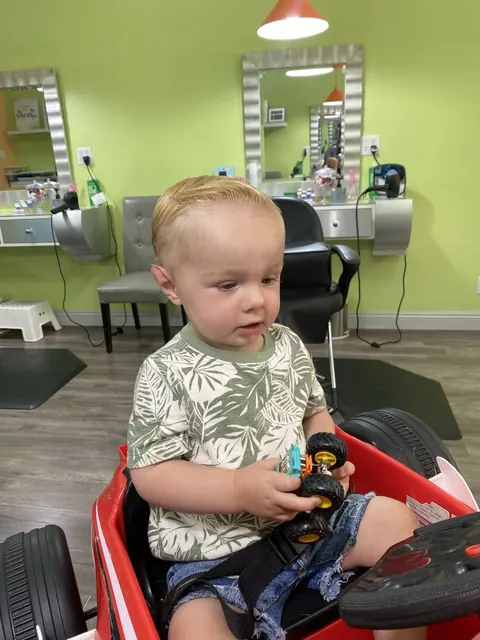 First haircut moment at Sparkles and Spikes kids salon #073