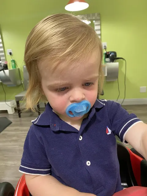 First haircut moment at Sparkles and Spikes kids salon #076