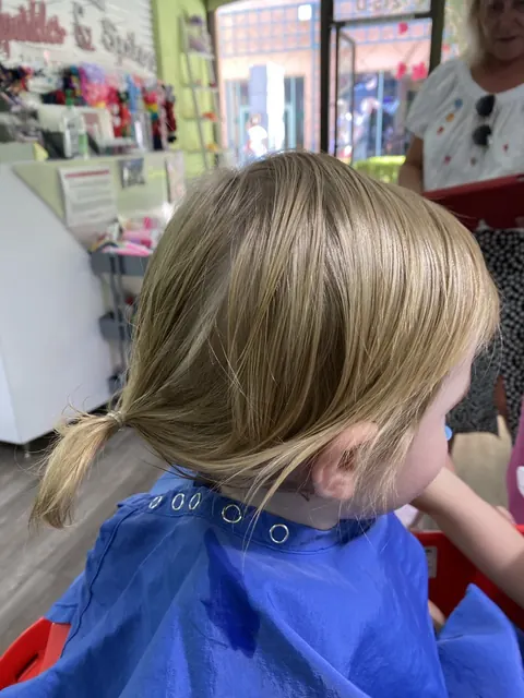First haircut moment at Sparkles and Spikes kids salon #077