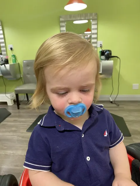 First haircut moment at Sparkles and Spikes kids salon #078