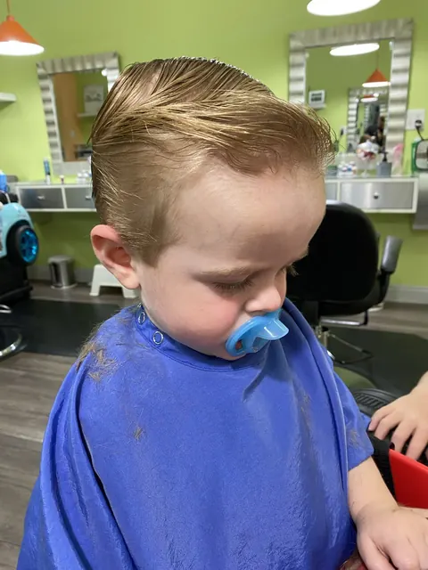 First haircut moment at Sparkles and Spikes kids salon #079