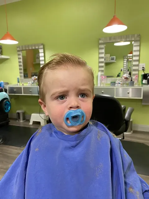 First haircut moment at Sparkles and Spikes kids salon #080