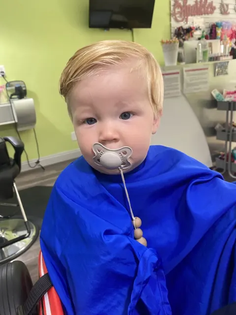 First haircut moment at Sparkles and Spikes kids salon #087
