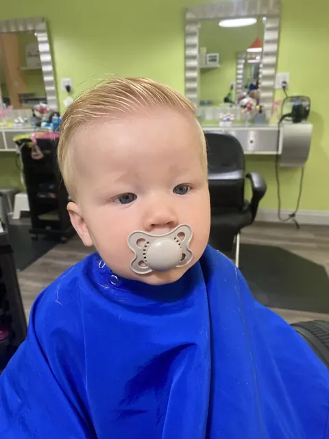 First haircut moment at Sparkles and Spikes kids salon #088