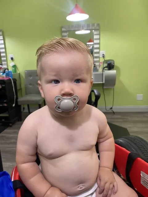 First haircut moment at Sparkles and Spikes kids salon #089
