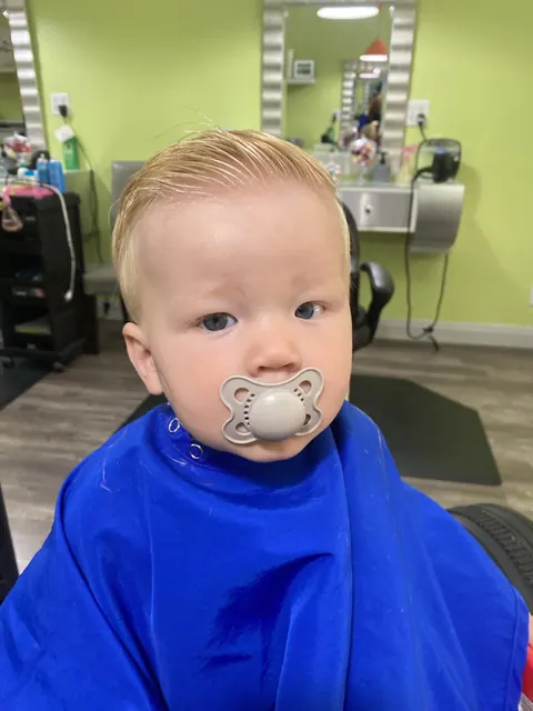 First haircut moment at Sparkles and Spikes kids salon #091