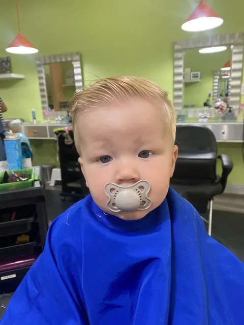 First haircut moment at Sparkles and Spikes kids salon #092