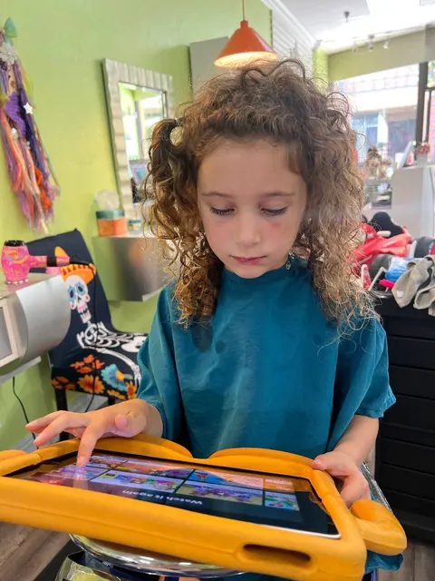 Girl haircut at Sparkles and Spikes kids salon #029